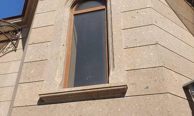 Облицовка фасада материалом туф