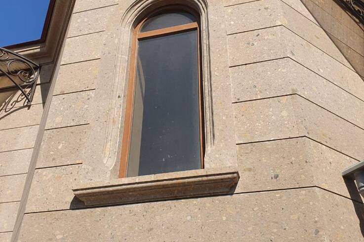 Облицовка фасада материалом туф