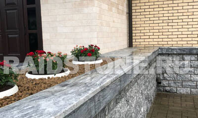 Облицовка фасада травертином