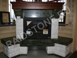 Камин угловой из мрамора Бидасар грин и бучардированного Волокас