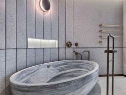 Бело-серая ванна из мрамора
